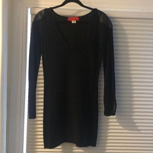 Black sweater dress with leather accents